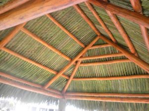 A close up of the roof structure of a hut